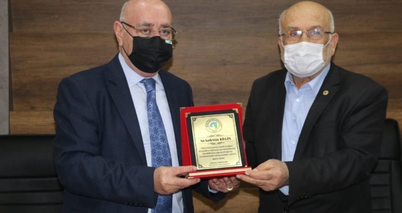 Hayırsever iş adamları ve esnafa plaket